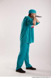 FALCO DOCTOR STANDING POSE WITH KNIFE